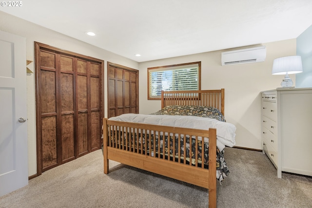 311 S 68th Pl, Springfield, OR 97478 - bedroom with a wall unit AC, carpet floors, and recessed lighting