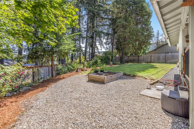 311 S 68th Pl, Springfield, OR 97478 - fenced backyard with a patio