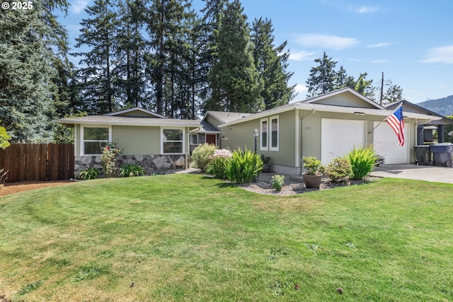 311 S 68th Pl, Springfield, OR 97478 - ranch-style house with an attached garage, driveway, and stone siding