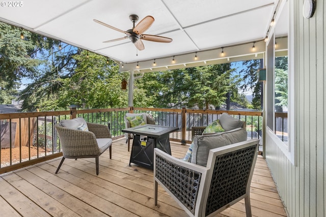 311 S 68th Pl, Springfield, OR 97478 - deck featuring ceiling fan and an outdoor hangout area