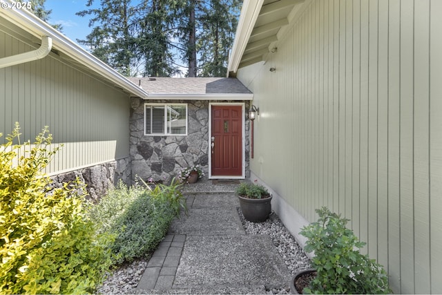 311 S 68th Pl, Springfield, OR 97478 - entrance to property with stone siding and a shingled roof