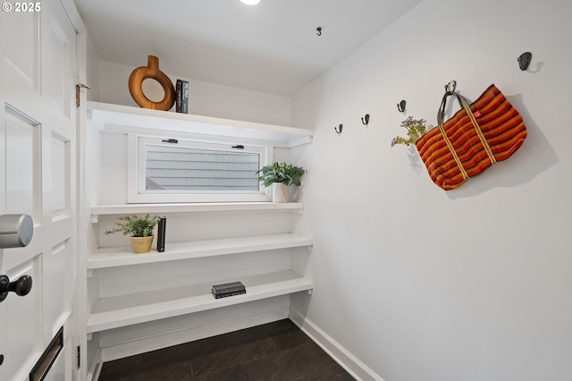 interior space featuring baseboards