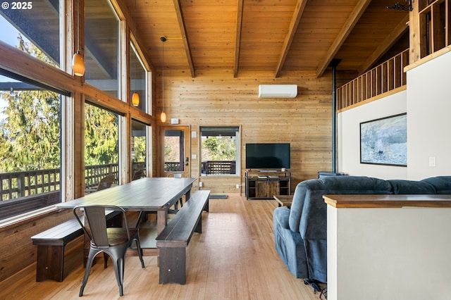 dining area featuring wooden ceiling, a wall unit AC, wood walls, wood finished floors, and beam ceiling