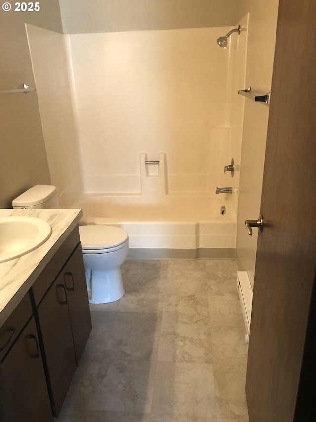 323 S Locust St, Canby, OR 97013 - bathroom featuring vanity, bathtub / shower combination, and baseboard heating