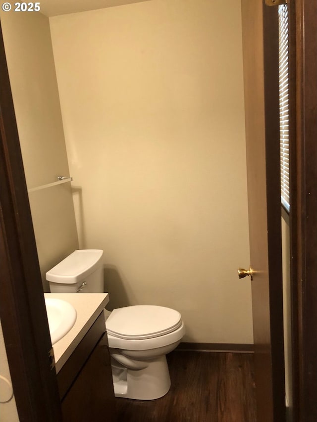 323 S Locust St, Canby, OR 97013 - half bath featuring vanity and wood finished floors