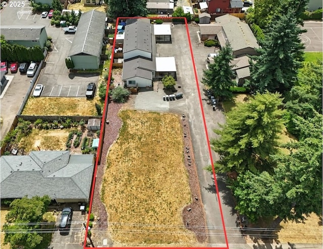 323 S Locust St, Canby, OR 97013 - aerial perspective of suburban area with property boundaries highlighted