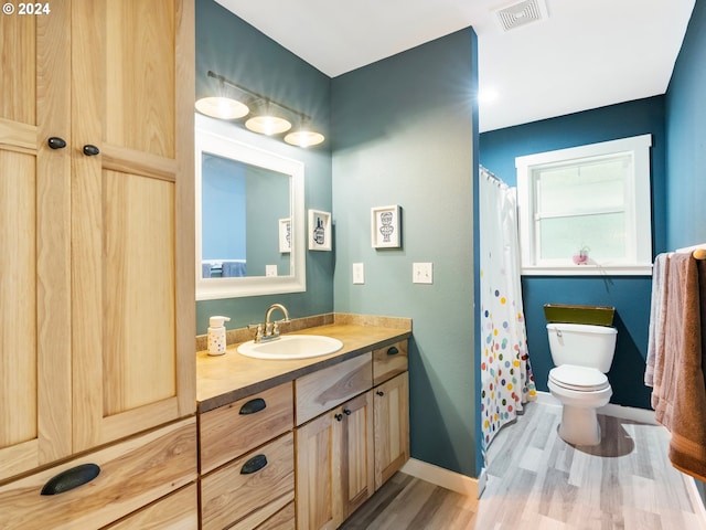 27915 NE Thompson Cir, Yacolt, WA 98675 - bathroom featuring wood finished floors, vanity, and a shower with curtain