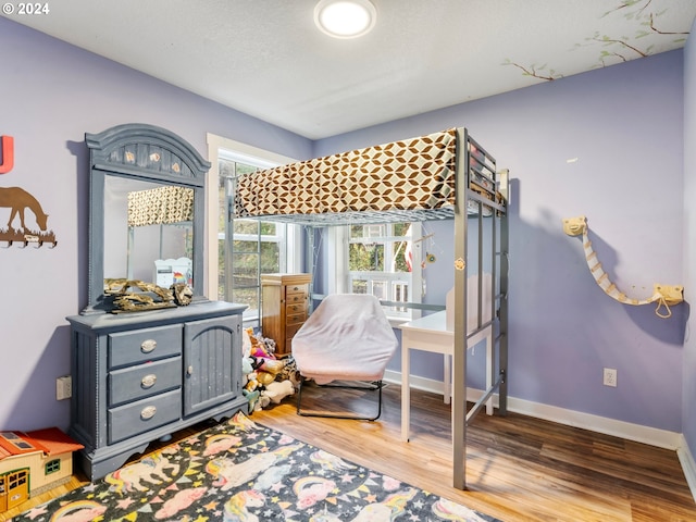 27915 NE Thompson Cir, Yacolt, WA 98675 - bedroom with wood finished floors and baseboards