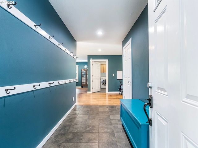 27915 NE Thompson Cir, Yacolt, WA 98675 - hall featuring washer / clothes dryer, recessed lighting, and dark stone finish flooring