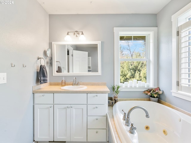 27915 NE Thompson Cir, Yacolt, WA 98675 - bathroom with plenty of natural light, vanity, and a whirlpool tub