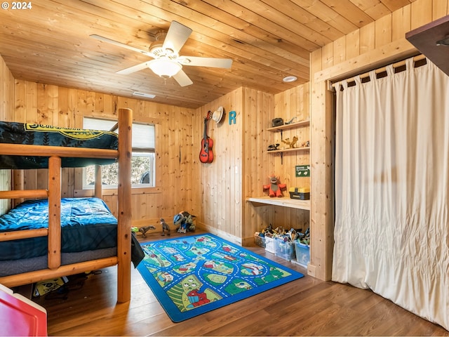 27915 NE Thompson Cir, Yacolt, WA 98675 - bedroom featuring wood ceiling, wooden walls, and wood finished floors