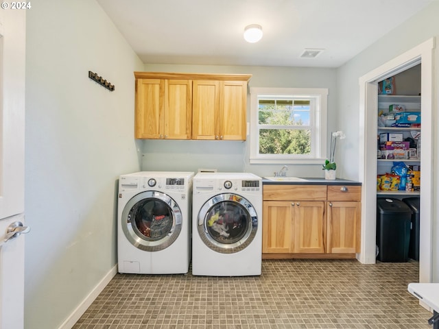 27915 NE Thompson Cir, Yacolt, WA 98675 - laundry area with cabinet space and washing machine and clothes dryer