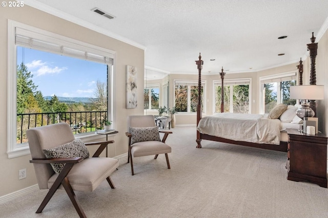 bedroom with crown molding, baseboards, visible vents, and light carpet