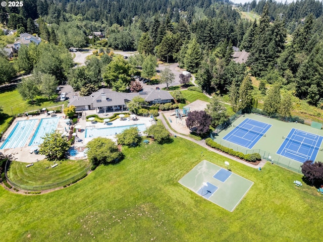 drone / aerial view with a view of trees