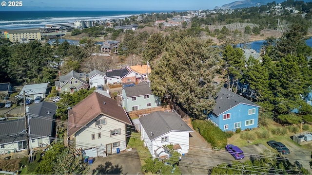 aerial view featuring a residential view and a water view