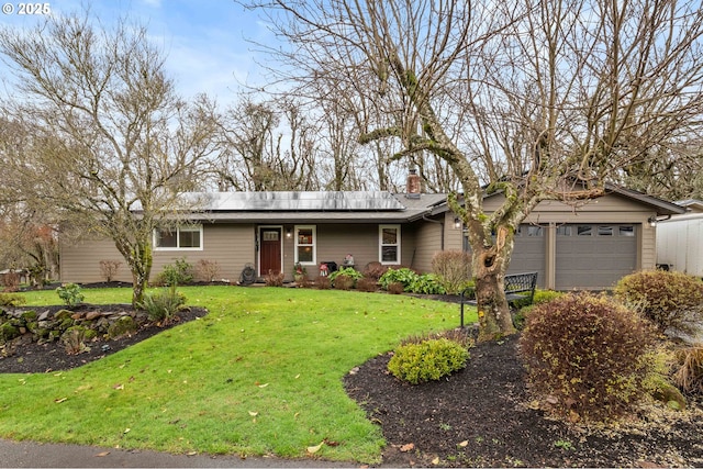 single story home featuring solar panels, a garage, and a front lawn