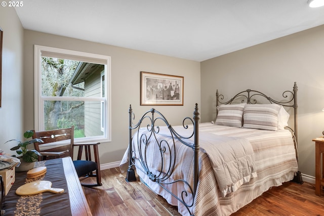 bedroom featuring wood-type flooring