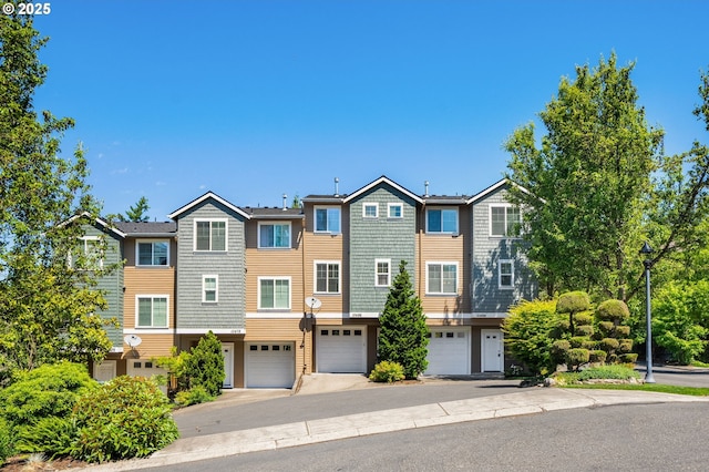 10494 NW Forestview Way, Portland, OR 97229 - view of property with a garage and driveway