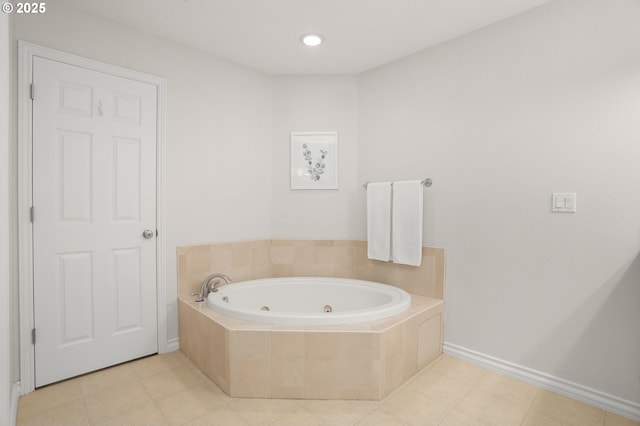 10494 NW Forestview Way, Portland, OR 97229 - bathroom with a whirlpool tub, baseboards, and tile patterned floors