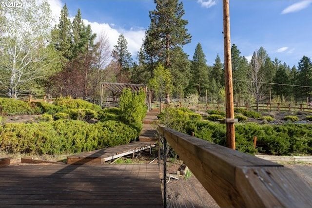 surrounding community featuring a wooden deck