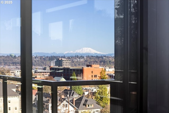 balcony featuring a mountain view