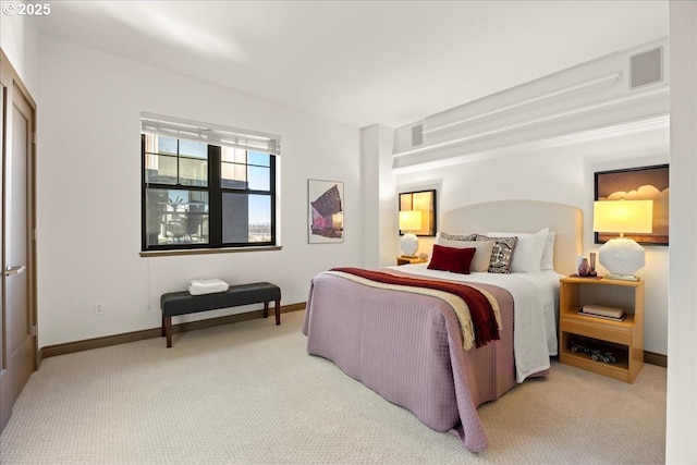 bedroom featuring light colored carpet