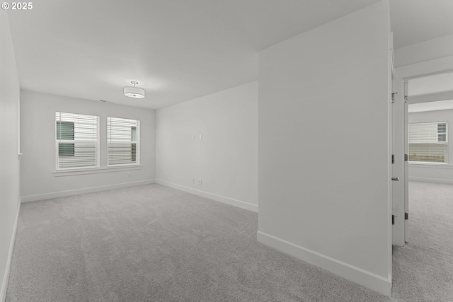 15129 SW Huntwood St, Tigard, OR 97224 - unfurnished room with carpet floors, baseboards, and healthy amount of natural light
