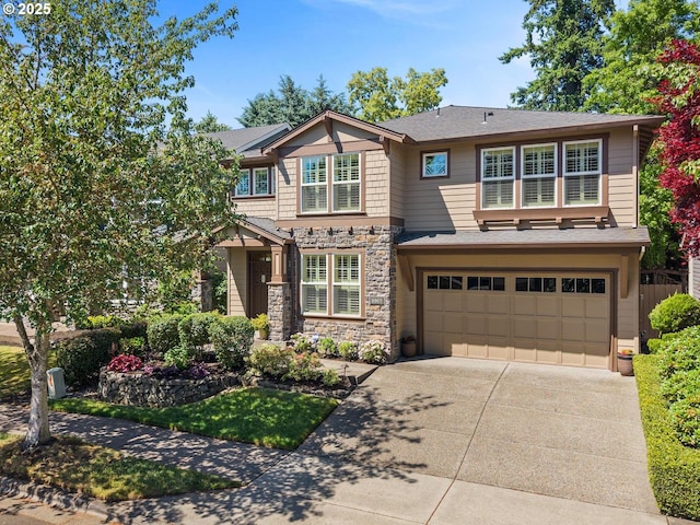 8967 SW 184th Dr, Beaverton, OR 97007 - view of front of home with an attached garage, driveway, stone siding, and roof with shingles