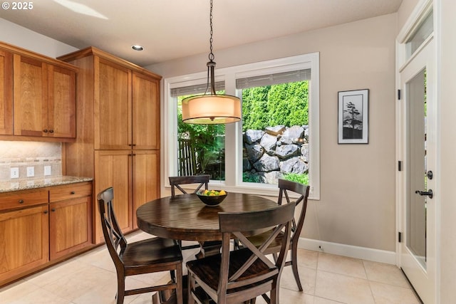 8967 SW 184th Dr, Beaverton, OR 97007 - dining room featuring light tile patterned floors and recessed lighting