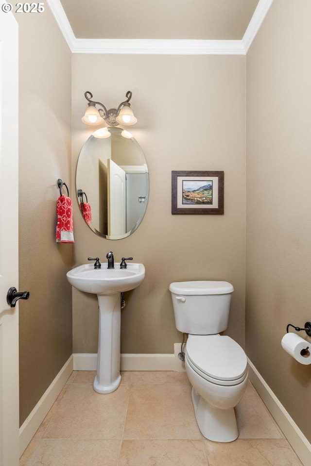 8967 SW 184th Dr, Beaverton, OR 97007 - half bathroom featuring crown molding and tile patterned floors