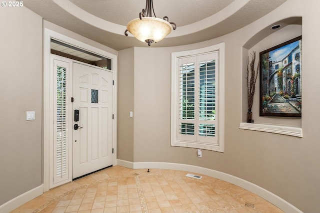 8967 SW 184th Dr, Beaverton, OR 97007 - foyer with inlaid floor details and light tile patterned floors