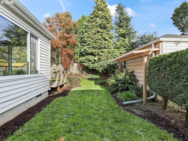 view of yard with fence