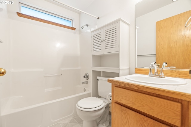 bathroom with vanity, toilet, and shower / washtub combination