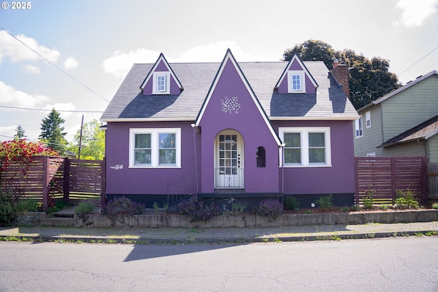 3710 SE 86th Ave, Portland, OR 97266 - view of front of home with stucco siding and a chimney