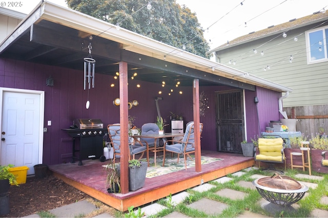 3710 SE 86th Ave, Portland, OR 97266 - wooden deck with a fire pit, a grill, and outdoor dining area