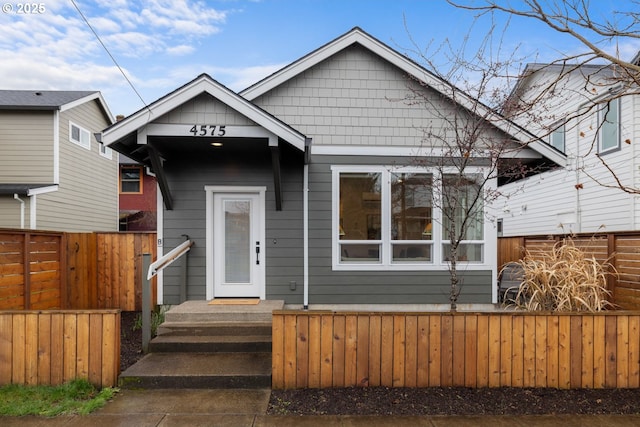 view of front facade with fence private yard