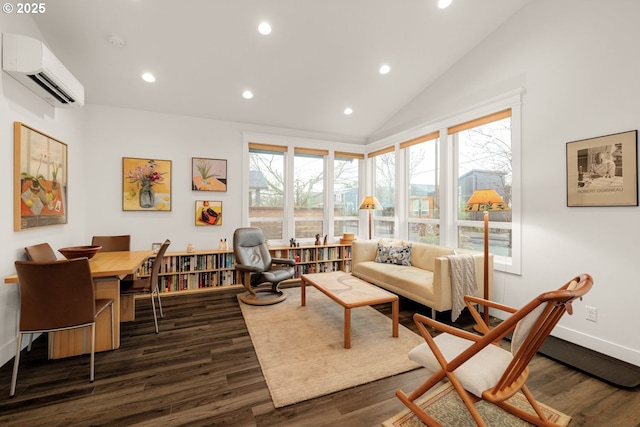 living area with dark wood finished floors, plenty of natural light, lofted ceiling, and a wall unit AC