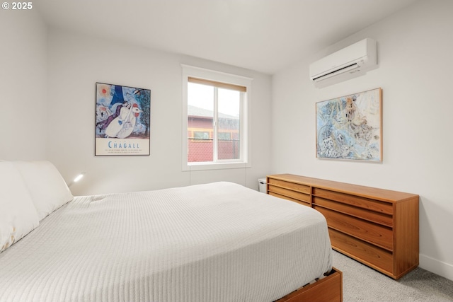 bedroom with light colored carpet, a wall mounted AC, and baseboards