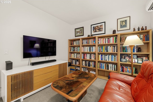 interior space featuring carpet and a wall mounted AC