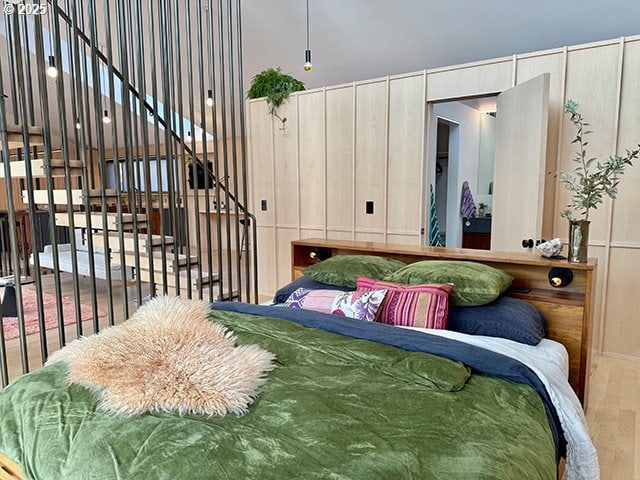 bedroom with wood finished floors