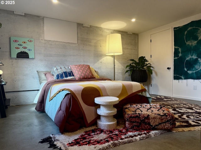 bedroom with concrete flooring