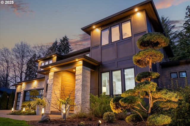 view of property exterior at dusk