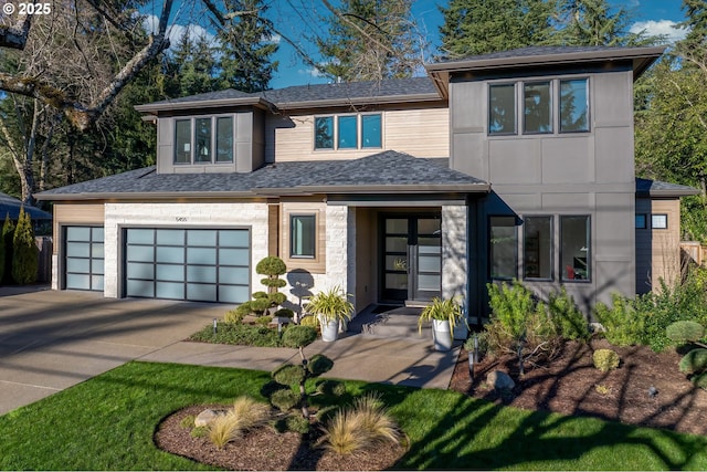 view of front of home with a garage