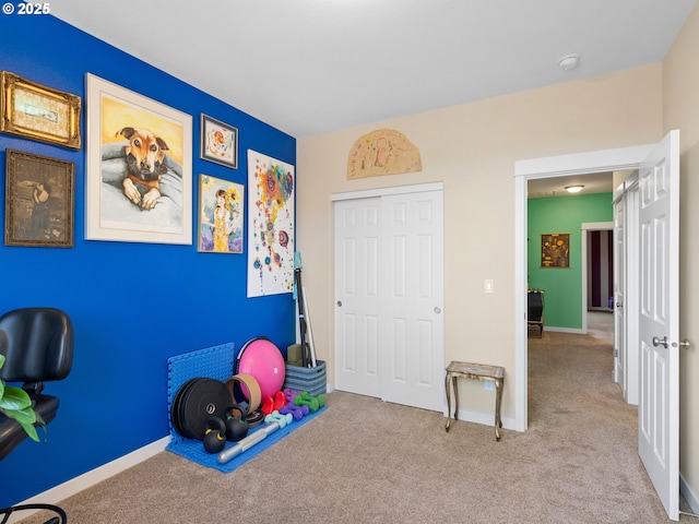 game room featuring light colored carpet