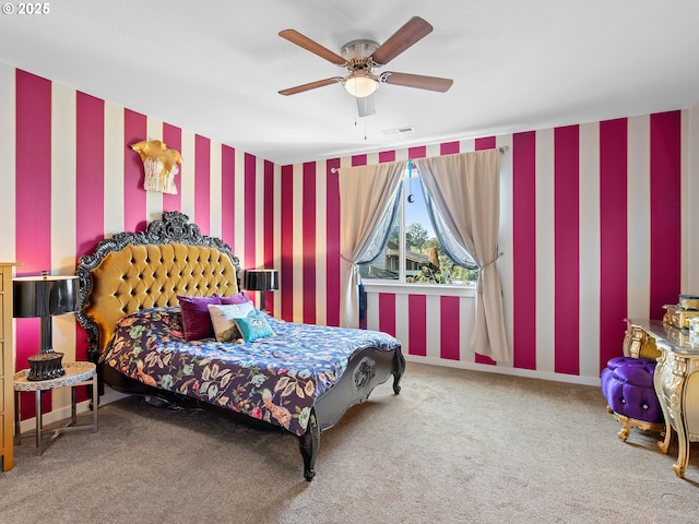 bedroom featuring ceiling fan and carpet floors