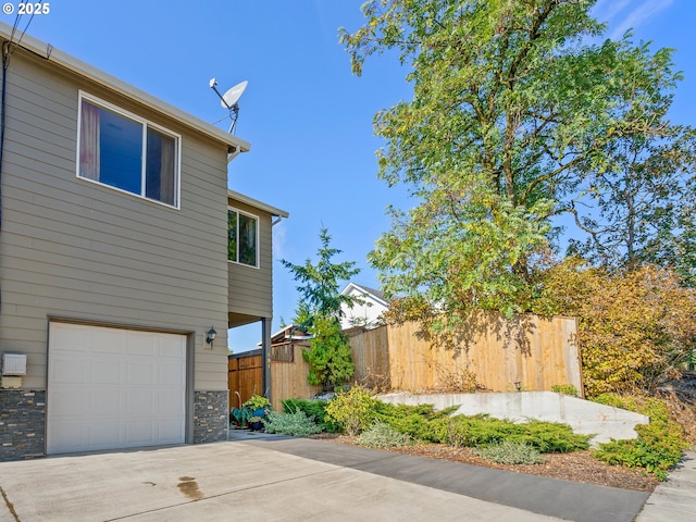 view of home's exterior with a garage