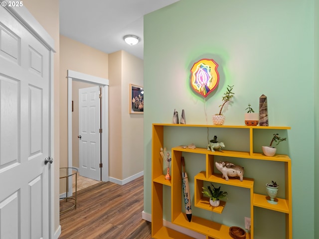 corridor featuring hardwood / wood-style floors