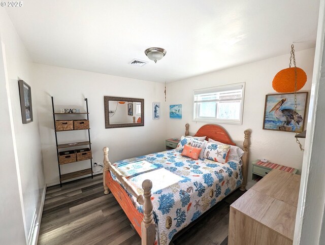 96335 Dawson Rd, Brookings, OR 97415 - bedroom with wood finished floors and visible vents