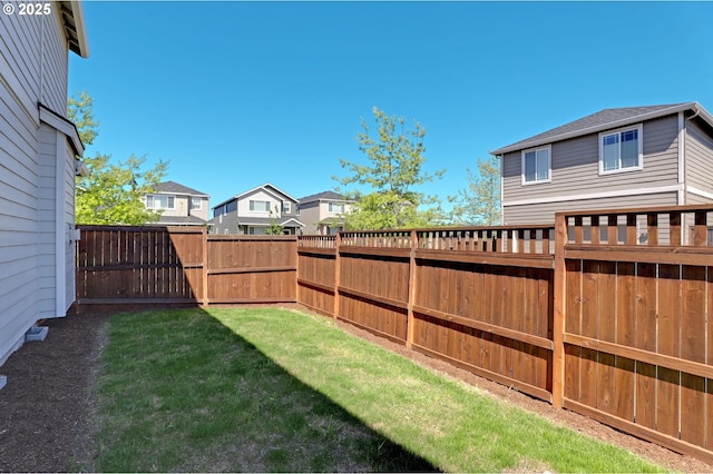 view of yard with a residential view