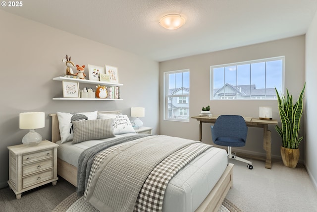 bedroom featuring carpet